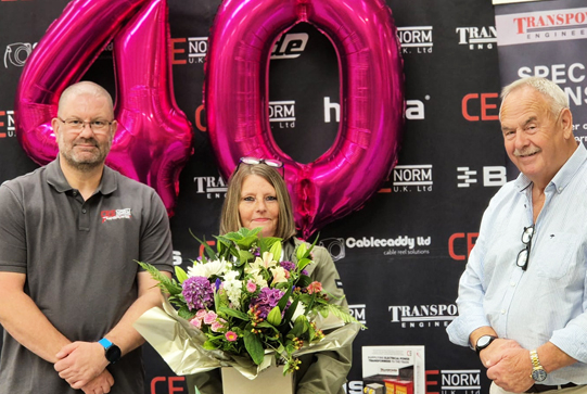 Ian Lockley (Ceenorm UK Ltd MD), Christine Corbett, and Tony Potts (owner and former MD)